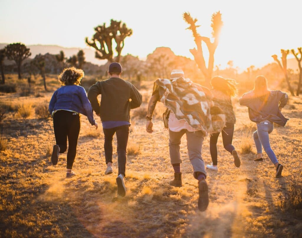 emotionally wealthy people running through desert