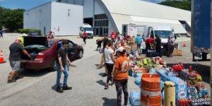 Volunteers handing out water after the July flood