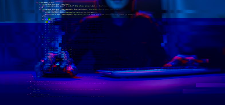 Pictorial representation of keylogger malware like KLogEXE and FPSpy. Person working on a laptop with lines of code displayed on the screen, with a blurred effect indicating motion or activity, surrounded by a vivid blue and red lighting.