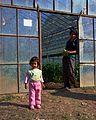 Greenhouse worker with child in Adrasan, Turky