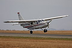 Mission Aviation Fellowship, one wheel on runway