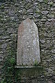 Memorial plaque of the Smyth family at the east gable of the refectory