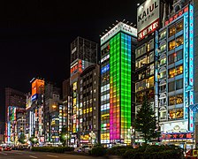 Colorful illuminated facades of buildings at night, with green, blue and pink lights, Kabukicho, Shinjuku, Tokyo.jpg