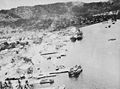 Allied bombers drop parachute fragmentation bombs on Simpson Harbor at Rabaul on November 2, 1943.