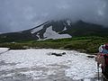 Daisetsu-zan, hokkaido, Japan. On the mountain side there was remaining snow in a swan-shape spreading its wings in july.7月の大雪山旭岳に見られる「白鳥の雪渓」