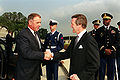 Cohen with Adolf Ogi, July 2000.