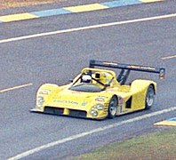 Kremer K8 -3 - Jurgen Lassig, Franz Konrad & Antonio Hermann leads Ferrari 333SP -1 - Massimo Sigala, Jay Cochran & Rene Arnoux through the Esses at Le Mans 1995 (49627445522)-cropped.jpg