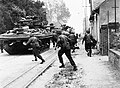 House to house fighting with the Germans at Riva Bella, near Ouistreham. Sherman DD tanks are providing fire support and cover. 6 June 1944.