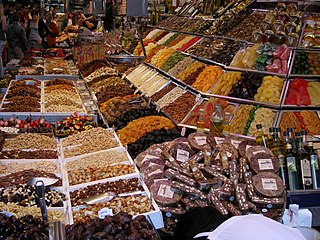 Català: Parada de fruita seca i llaminadures English: Dried fruit and confectionery stall