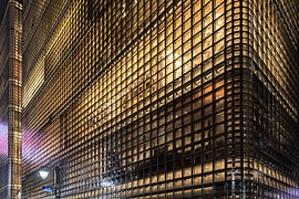 Exterior view of the illuminated facade of Maison Hermès, Ginza, Tokyo, Japan.jpg