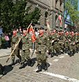 Soliders of 1st Tank Battalion of 15 Great Poland's Armoured Cavalery Brigade with banner of 15th Reg.