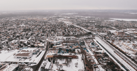 Aerial view of a city during the winter with cleared roads