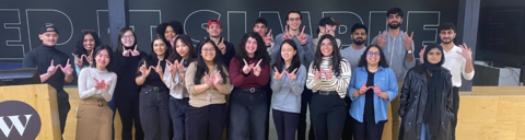 Wealthsimple co-op students at the front of the office