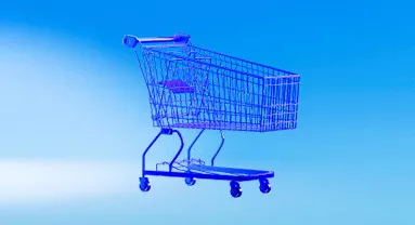 shopping cart over a blue background