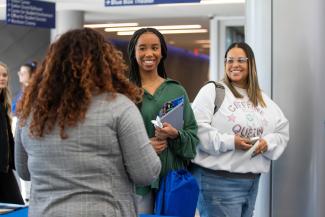 Student talking to recruiter