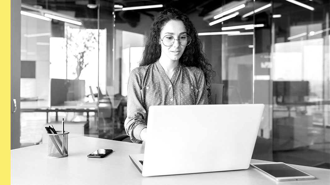 A woman working on her laptop