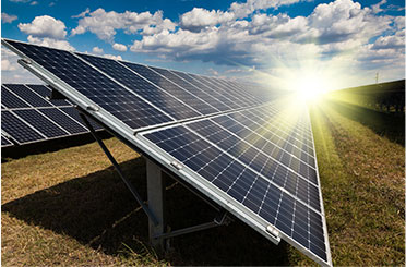 solar panels in field under sunlight