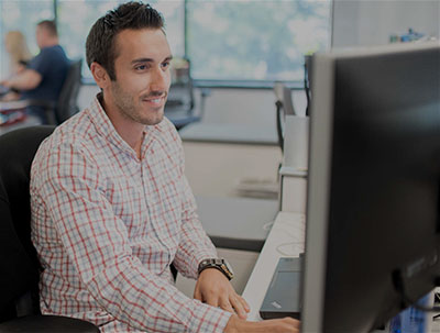 office worker watching online webinar