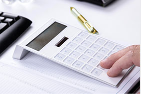 man using white calculator