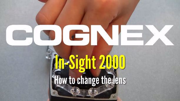 person demonstrates changing lens on in-sight 2000