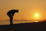 Silhouette of a person at sunset during a heatwave. (Image credit: iStock)