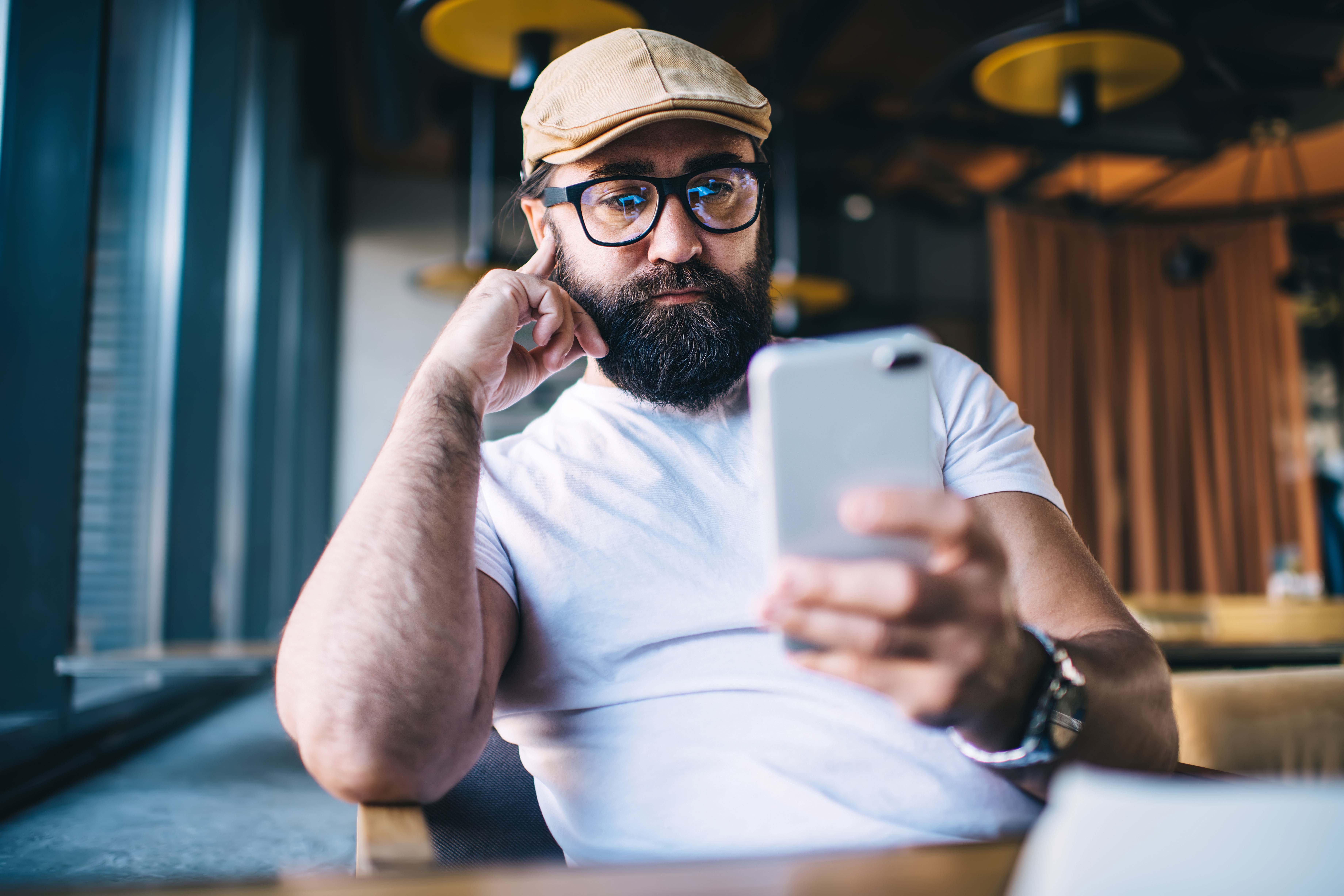 Man looking at mobile phone