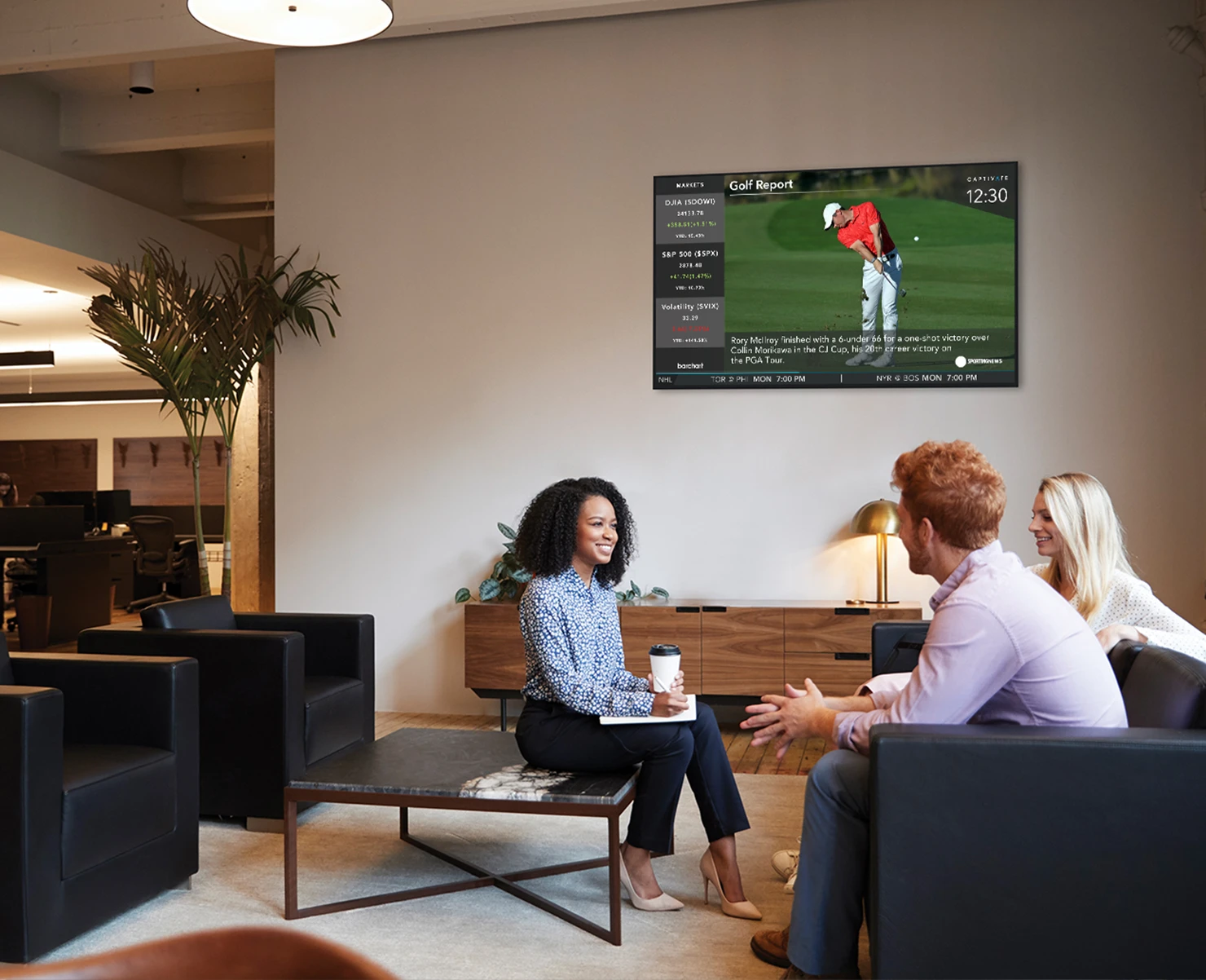 3x people sitting with GOLF content on screen