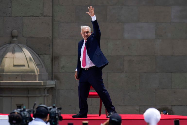 Lopez Obrador waves to supporters