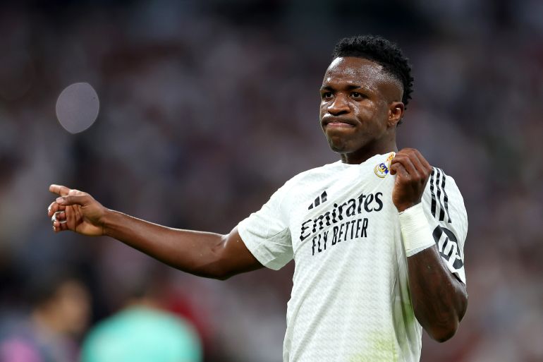 MADRID, SPAIN - SEPTEMBER 21: Vinicius Junior of Real Madrid celebrates scoring his team's third goal during the LaLiga match between Real Madrid CF and RCD Espanyol de Barcelona at Estadio Santiago Bernabeu on September 21, 2024 in Madrid, Spain. (Photo by Florencia Tan Jun/Getty Images)