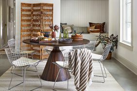 white dining room with room divider