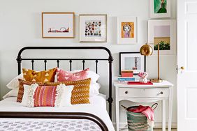 bedroom with framed artwork, patterned bedspread, twin bed