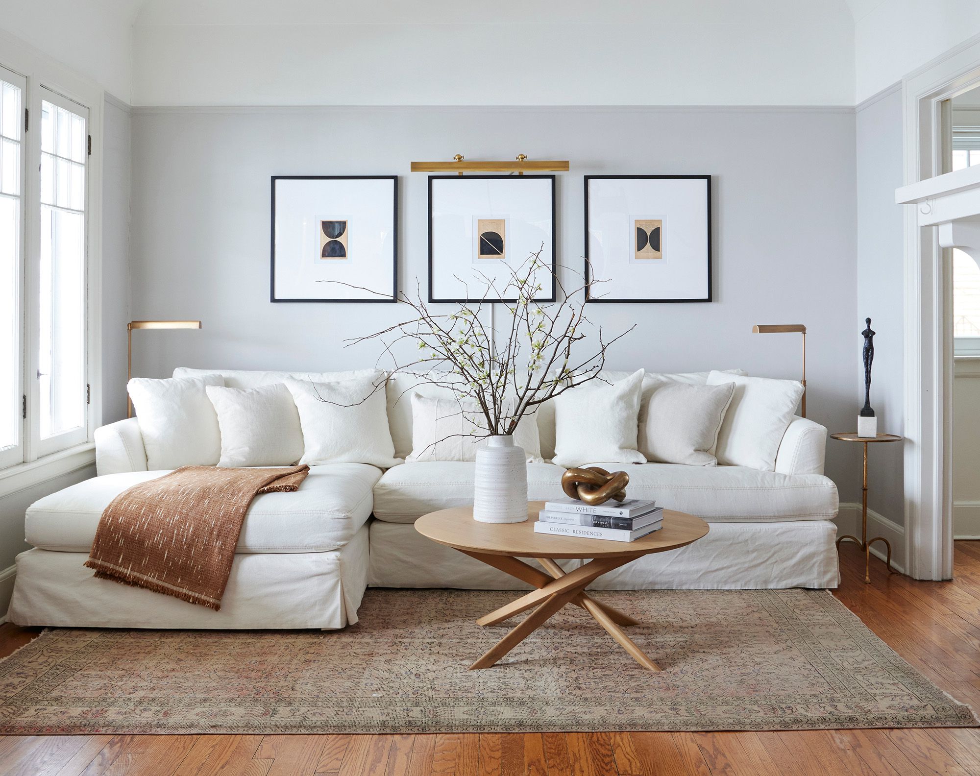 gray living room with white couch