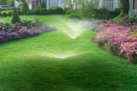 Sprinkler system watering lawn