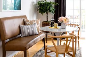 Dining room with bistro table and chairs, brown bench