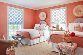 pink shared bedroom with carpet