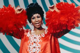 Aretha Franklin in a red dress with a turquoise background