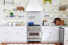 White kitchen with wood flooring