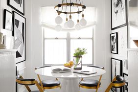 small white breakfast nook with black and white checkered floor