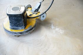 polishing concrete floor with floor polishing machine