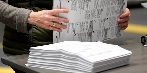 Stack of paper ballots