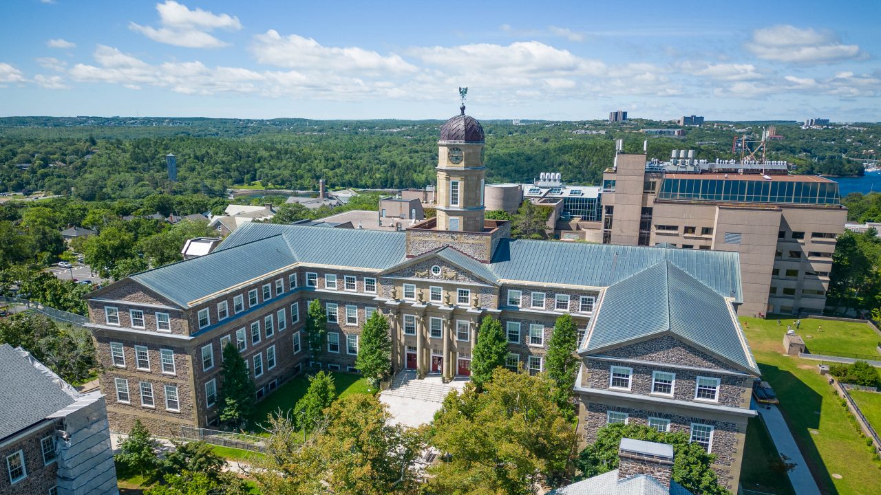 Henry Hicks building on a summer day