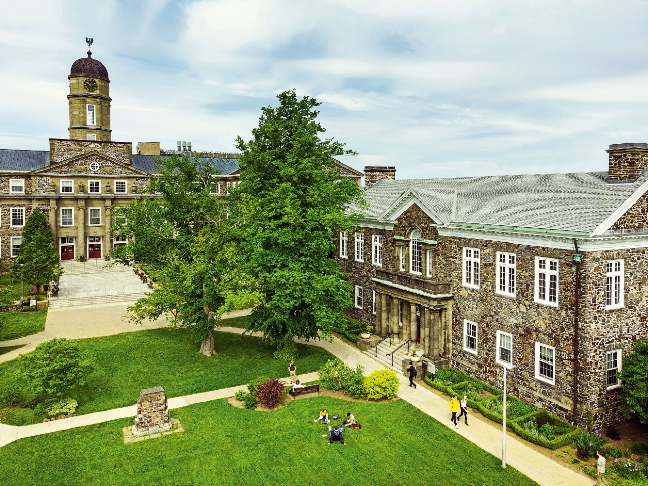 Aerial view of the lawned quad and stone buildings of Dalhousie's Studley Campus in Halifax. 