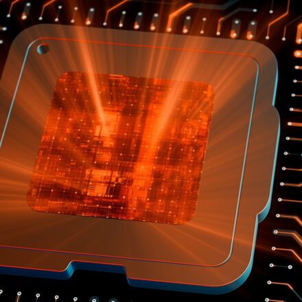 Digitally generated image of CPU chip on motherboard with its center emitting orange light outward.