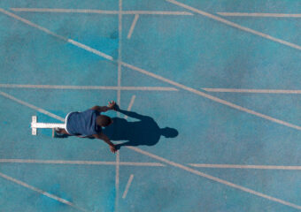 runner at starting line of a track