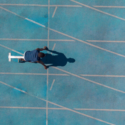 runner at starting line of a track