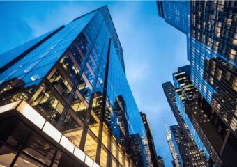 Evening view from street level of skyscrapers in midtown Manhattan, New York City.