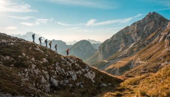 Line of mountaineers descend from summit