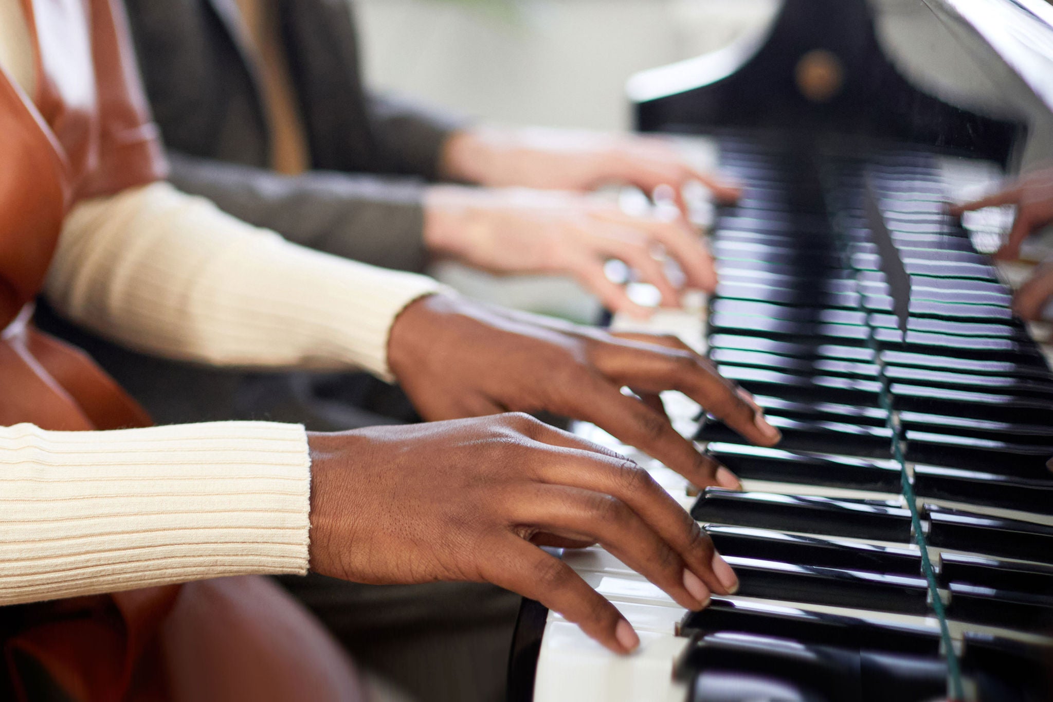 EY Musicians Playing Piano Duet