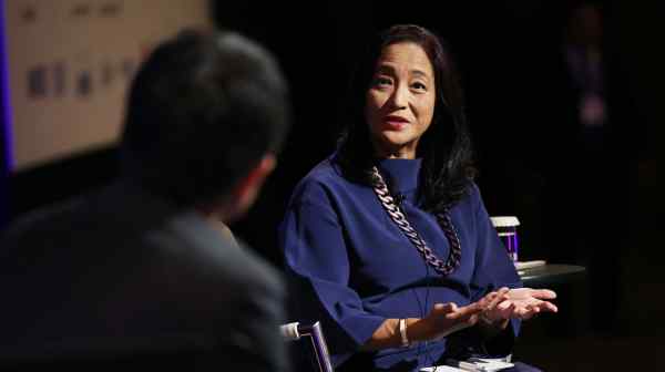 Miki Tsusaka, president of Microsoft Japan&nbsp;speaks on a panel at the Global Management Dialogue Oct. 28 in Tokyo. (Photo by Akitoshi Sugiura)