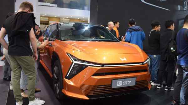 A Honda Motor EV is displayed in a showroom in Beijing. The automaker is slashing production capacity for&nbsp;gasoline vehicles by 30% in China. (Photo by Shizuka Tanabe)